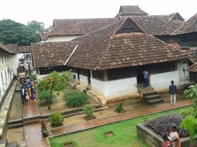 Classical Kerala Wooden Palace Courtyards and Stone Sculptures