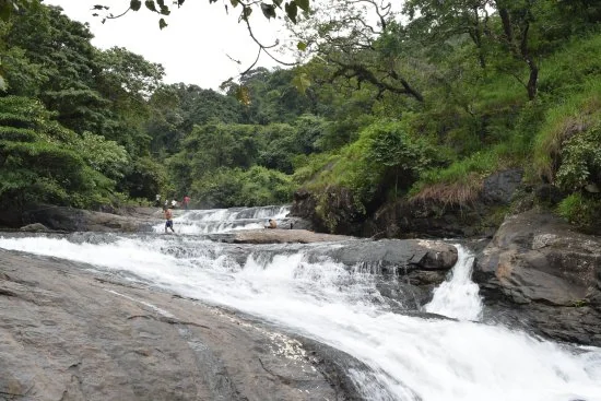 Kozhippara Waterfalls Flowing Over Granite Rocks in Kakkadampoyil Kozhikode