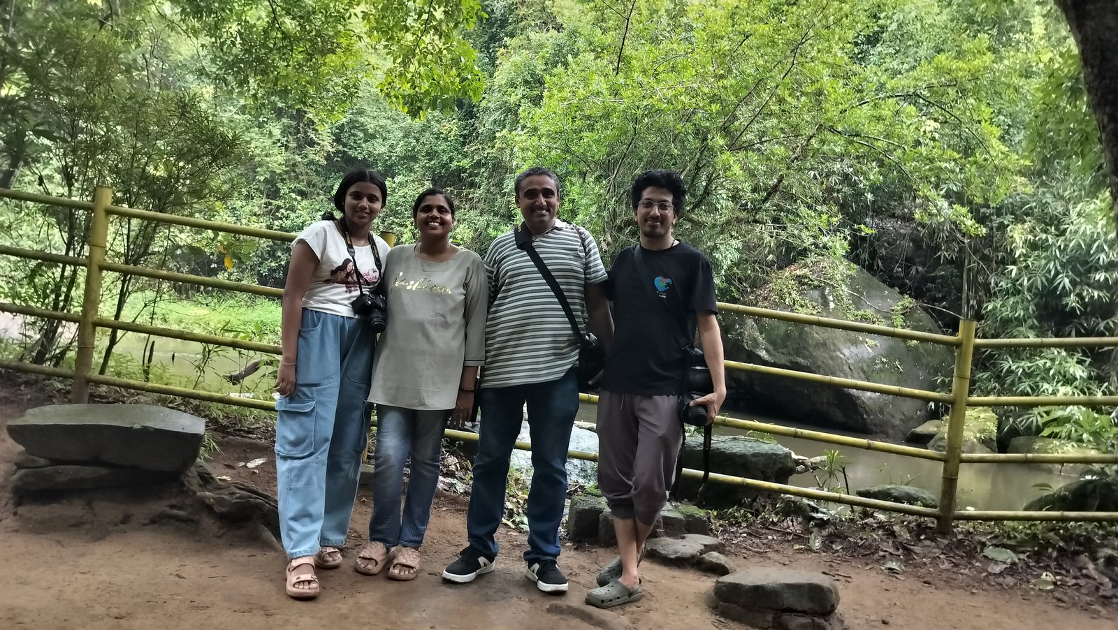 Visitors enjoying Thommankuthu eco tourism waterfall