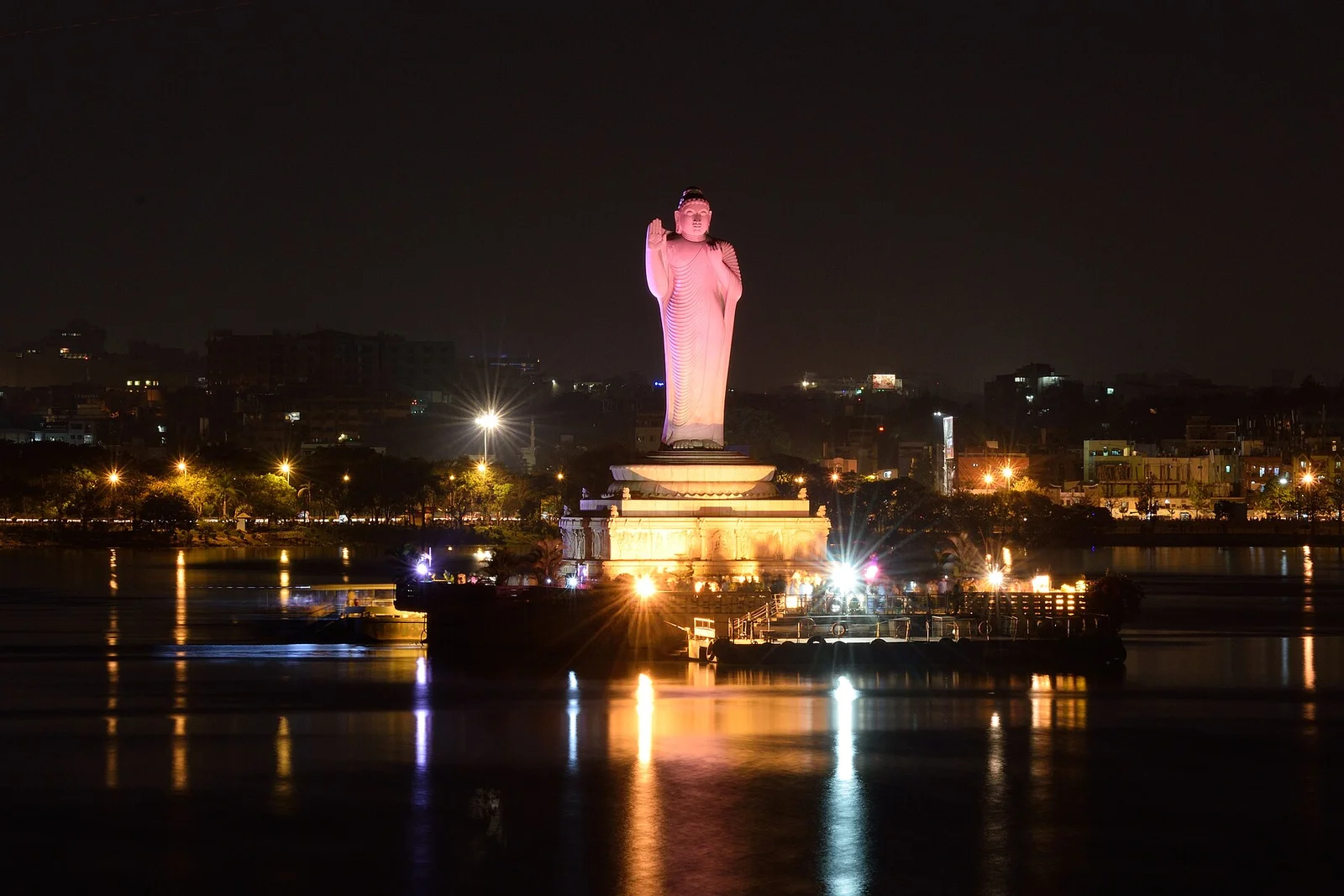 The Buddha statue standing in the middle of Husain Sagar