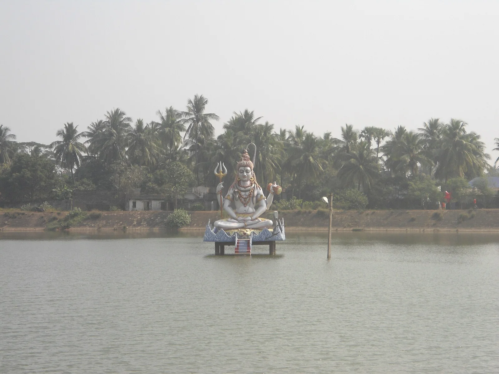 Temple tank and mandapa structures at Koti Theertham